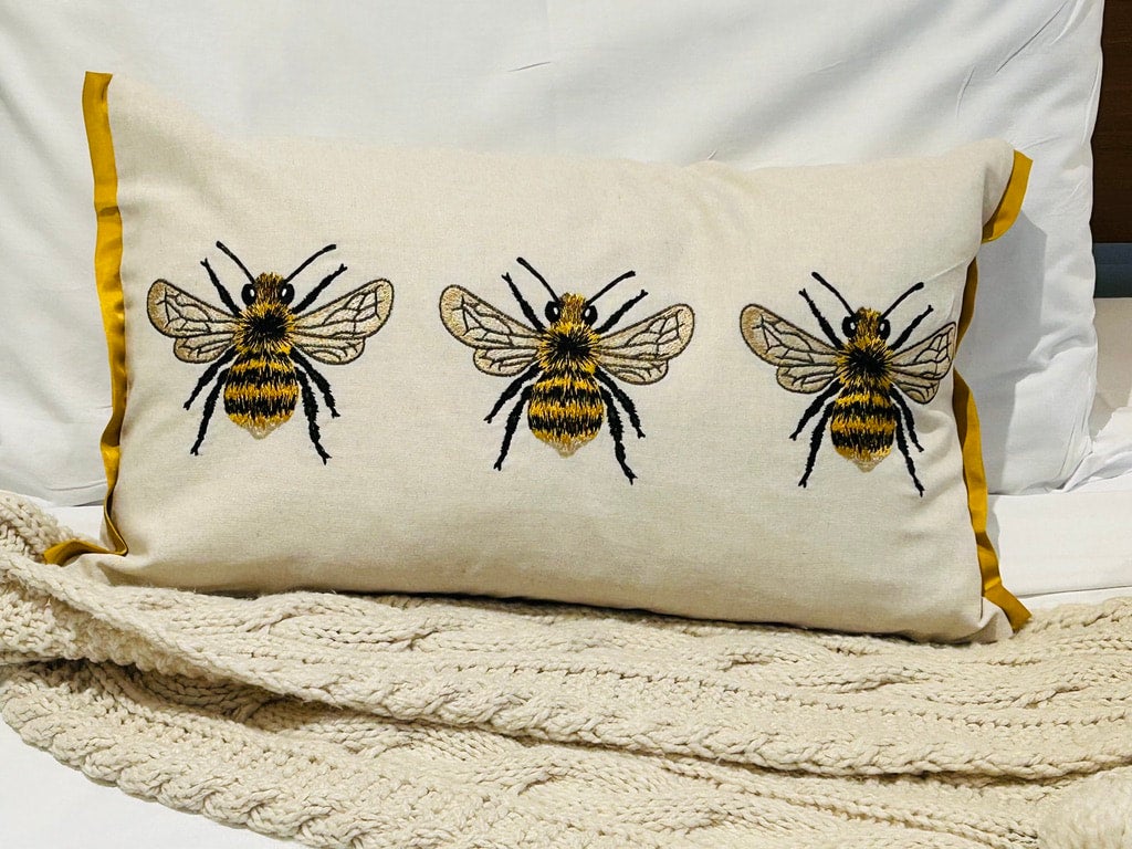 Embroidered bee hot sale pillow